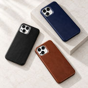 Coques en cuir pour iPhone — noir, bleu marine et cognac